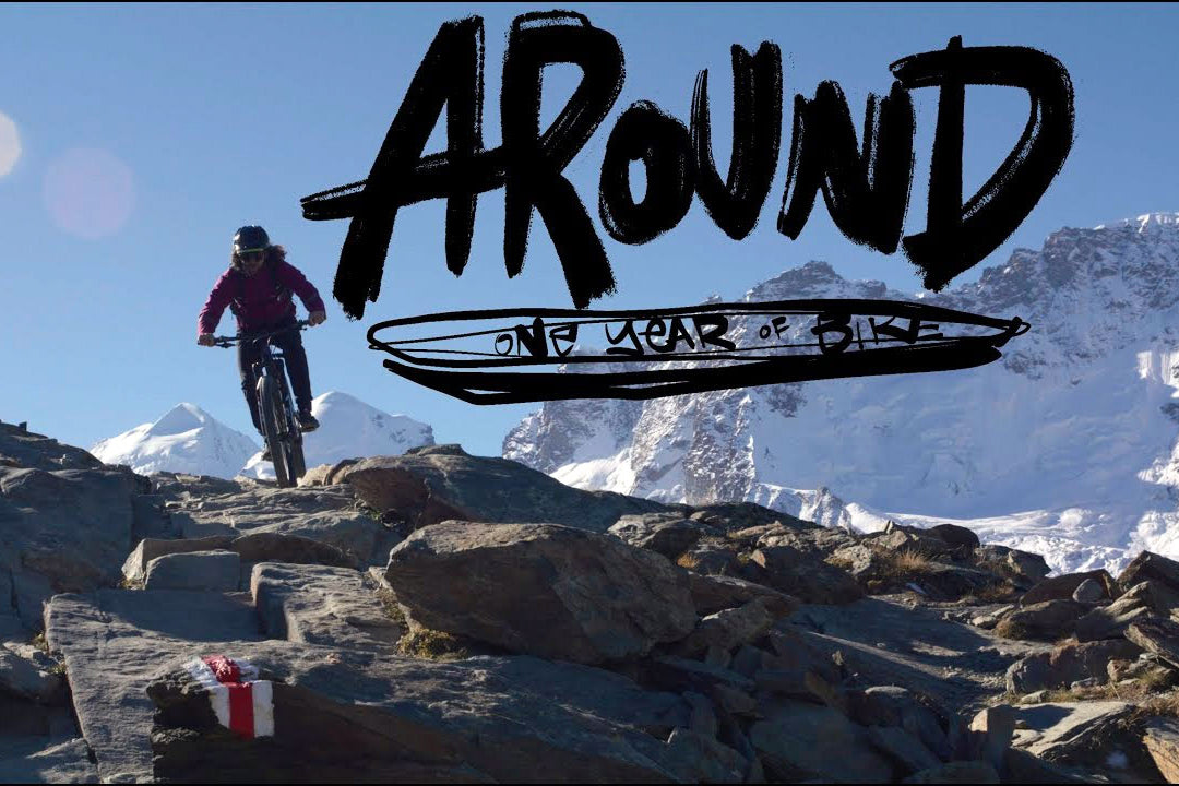 Silohete of Tito Tomasi riding a Kona Bike in the Alpine with the words Around One Year of Bike